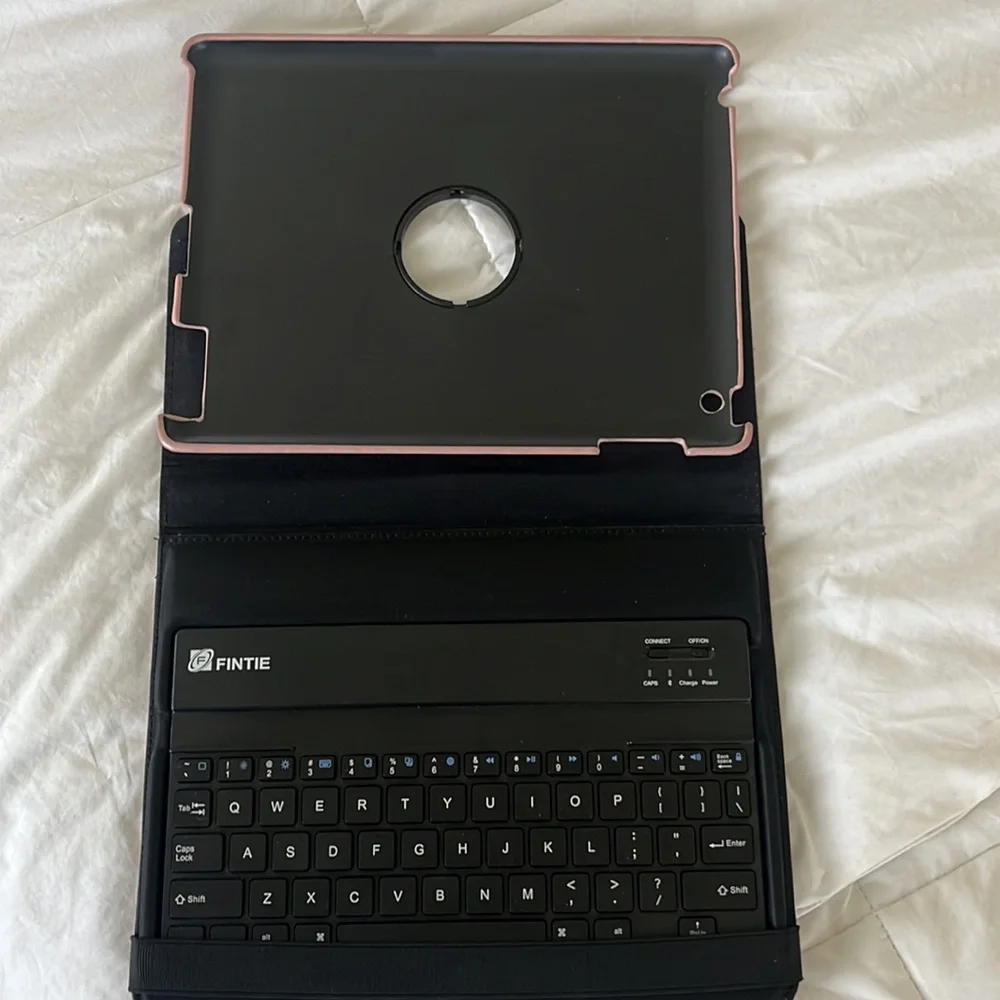 Rose gold iPad case with keyboard.